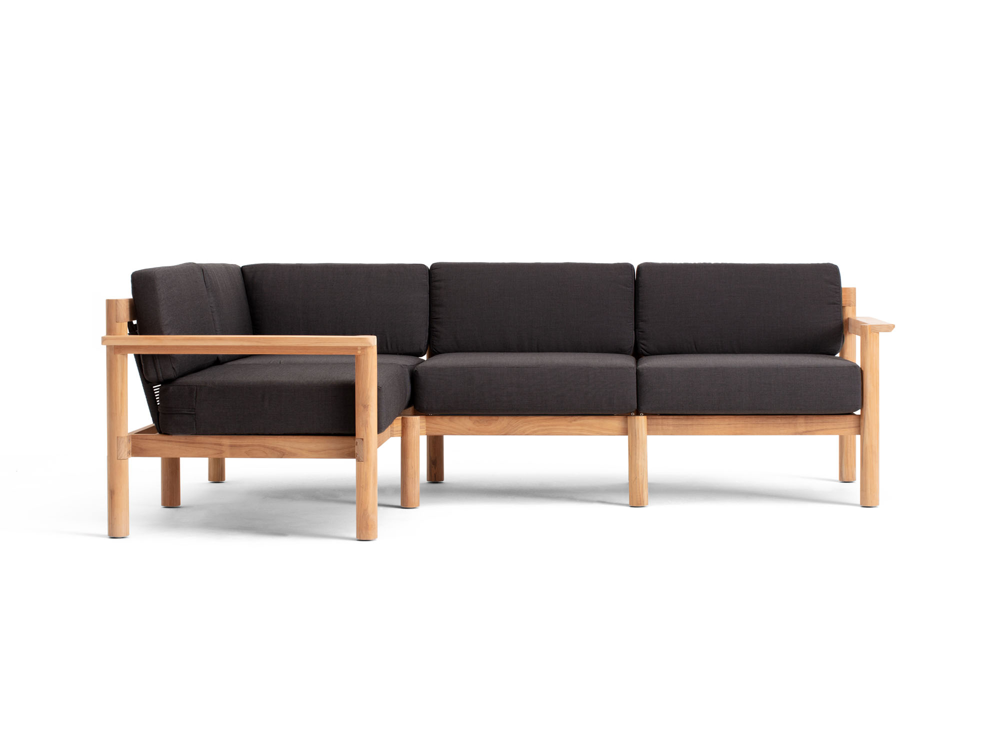 Front view of 4-piece outdoor sectional with black cushions